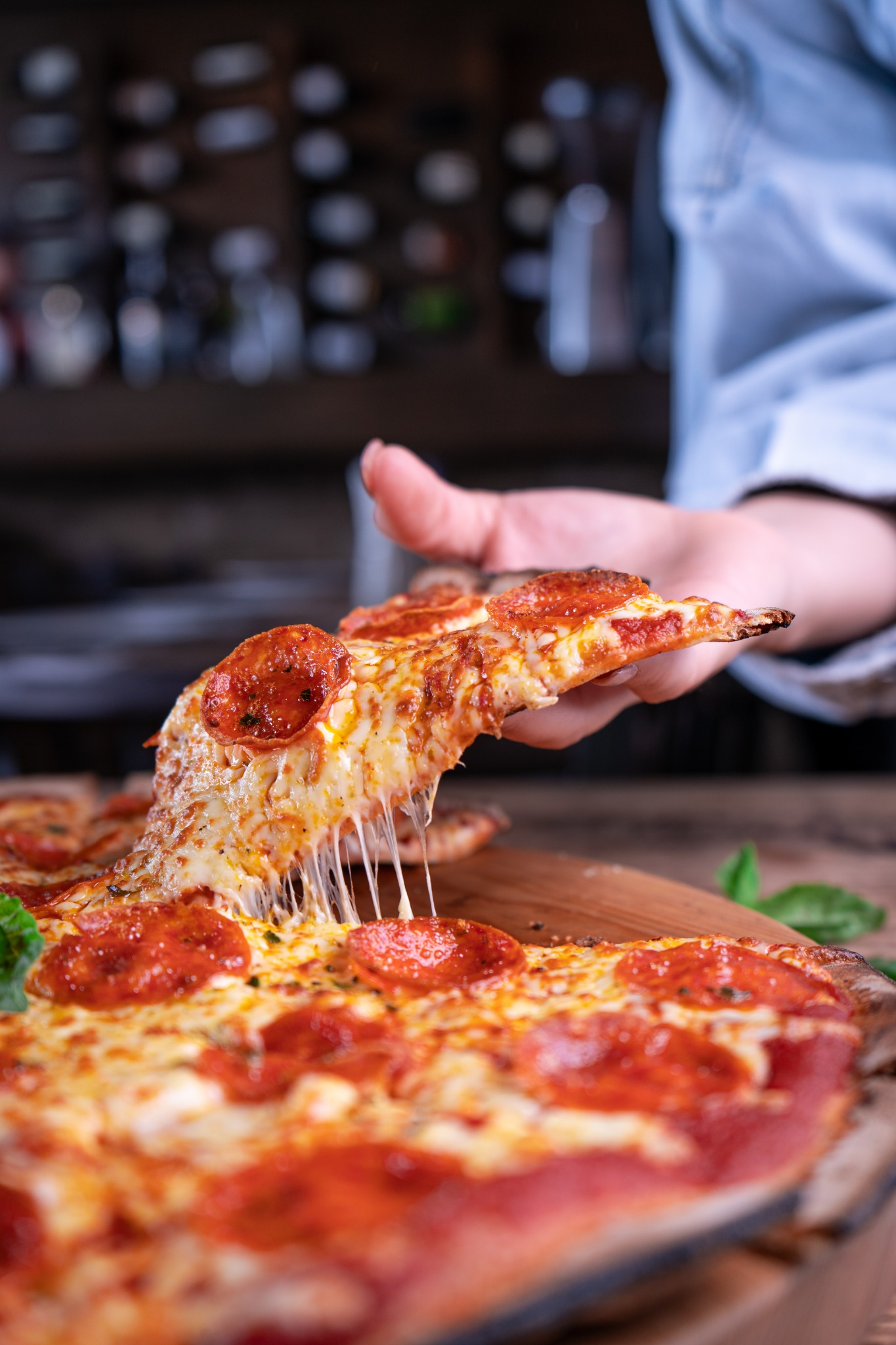 Pizza com queijo derretido